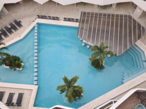 Discover Playa del Carmen from The Gallery Condos steps to the beach